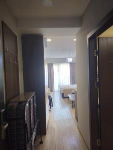 a hallway with a living room and a dining room at Bakuriani Crystal in Bakuriani