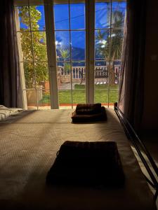 A bed or beds in a room at Ira Apartments