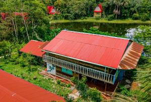 an overhead view of a building with red roof at PuraChata Ecolodge in Iquitos