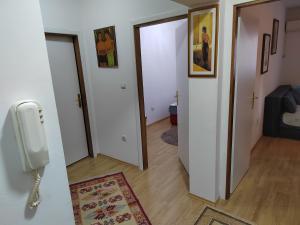 Postel nebo postele na pokoji v ubytování Banja Koviljaca Centar Apartman