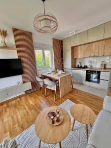 Kuchyň nebo kuchyňský kout v ubytování Apartman Sunrise