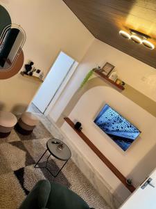 TV a/nebo společenská místnost v ubytování Tropical Suite Appart