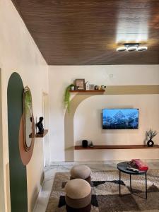 TV a/nebo společenská místnost v ubytování Tropical Suite Appart