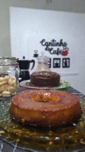 two donuts sitting on top of a table at Recanto Saqua in Saquarema +32 photos