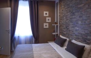 Ένα ή περισσότερα κρεβάτια σε δωμάτιο στο Beautiful Apartment In La Spezia