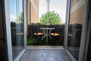 En balkon eller terrasse på Casa Ella