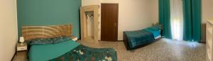 Postel nebo postele na pokoji v ubytování aeroporto room1