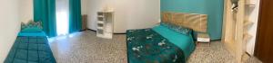 Postel nebo postele na pokoji v ubytování aeroporto room1