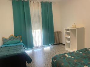 Postel nebo postele na pokoji v ubytování aeroporto room1