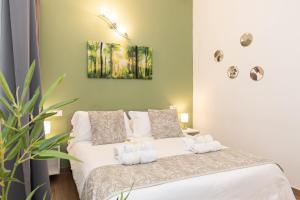 Postel nebo postele na pokoji v ubytování VittorioVeneto126 B&B