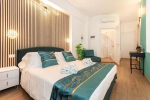Postel nebo postele na pokoji v ubytování VittorioVeneto126 B&B