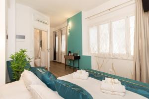 Postel nebo postele na pokoji v ubytování VittorioVeneto126 B&B