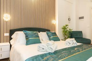 Postel nebo postele na pokoji v ubytování VittorioVeneto126 B&B