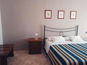 En eller flere senge i et værelse på Cascina Longoria + 45 billeder