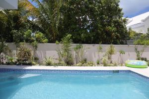 Πισίνα στο ή κοντά στο Ocean Pearl - Cozy Comfort Room with pool Nearby Sunset beach