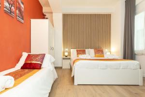Postel nebo postele na pokoji v ubytování VittorioVeneto126 B&B