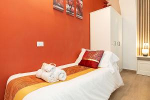 Postel nebo postele na pokoji v ubytování VittorioVeneto126 B&B