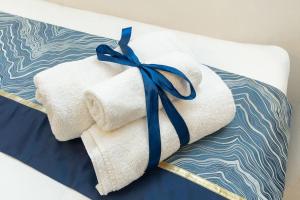 Postel nebo postele na pokoji v ubytování VittorioVeneto126 B&B