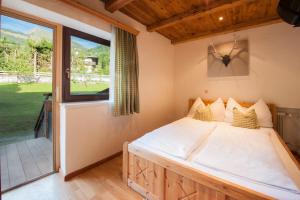 A bed or beds in a room at Landhotel Vordergrub
