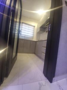 Kuchyň nebo kuchyňský kout v ubytování Dearest Service Apartment