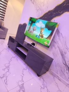 TV a/nebo společenská místnost v ubytování Dearest Service Apartment