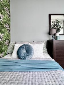 Postel nebo postele na pokoji v ubytování Apartament w centrum Łeby Zofia