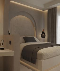 Postel nebo postele na pokoji v ubytování néreya luxury rooms