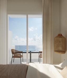 Postel nebo postele na pokoji v ubytování néreya luxury rooms