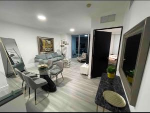 a living room with a table and a couch at Apartment in Panama City in Panama City