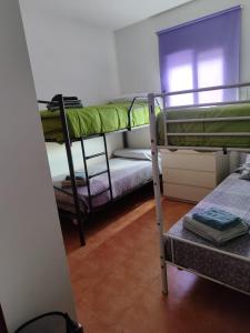 Katil atau katil-katil dalam bilik di Relax Pinares