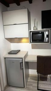 A kitchen or kitchenette at Smartroom LuLa