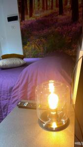 A bed or beds in a room at Smartroom LuLa