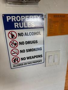 a sign on the side of a refrigerator at La Mare Fort Lauderdale Airport in Fort Lauderdale