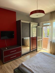 A bed or beds in a room at Guest House Elegance
