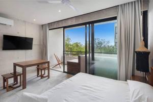 Postel nebo postele na pokoji v ubytování Soko Tulum + 66 fotografií