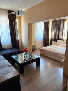 A bed or beds in a room at Guest House Elegance
