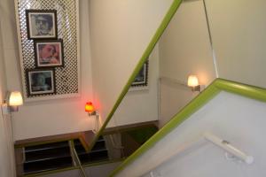 Katil atau katil-katil dalam bilik di Mini Hotel Causeway Bay