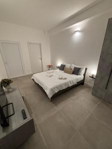 Postel nebo postele na pokoji v ubytování Helios Apartaments