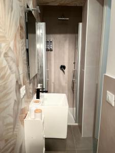 Koupelna v ubytování Helios Apartaments