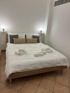 Postel nebo postele na pokoji v ubytování Helios Apartaments