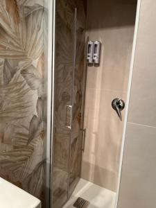 Koupelna v ubytování Helios Apartaments