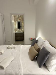 Postel nebo postele na pokoji v ubytování Helios Apartaments