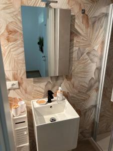 Koupelna v ubytování Helios Apartaments