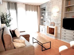 TV a/nebo společenská místnost v ubytování Family-Friendly Home in Central Barcelona 4BDR