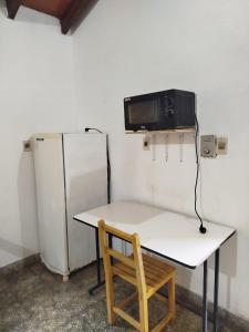 Kuchyň nebo kuchyňský kout v ubytování Monoambiente