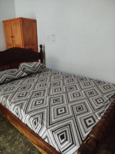 Postel nebo postele na pokoji v ubytování Monoambiente