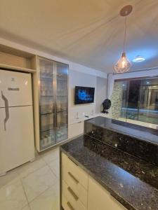 Køkken eller tekøkken på flat 017 Condominio Paraiso da Serra Negra - PE proximo Bodega de Veio