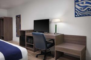 TV a/nebo společenská místnost v ubytování Hotel Zico, BW Signature Collection