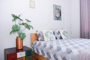 Postel nebo postele na pokoji v ubytování Cloud9 Apartments