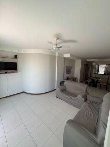 Posezení v ubytování Lumar Apartamento em praia do morro